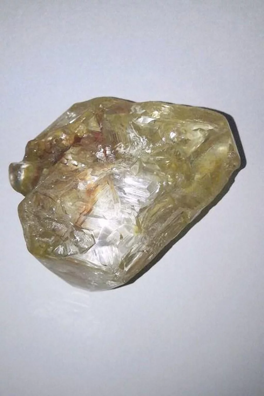 A 706-carat diamond is pictured on March 16, 2017  in Freetown, Sierra Leone. A pastor working in the mines of eastern Sierra Leone has unearthed a 706-carat diamond, the government said on March 16, 2017, as experts said the stone could rank as the 10th largest ever found. / AFP PHOTO / SAIDU BAH