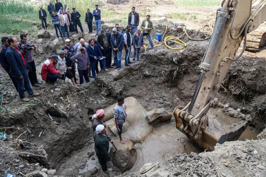 A quartzite colossus possibly of Ramses II and limestone bust of Seti II are seen after they were discovered at the ancient Heliopolis archaeological site in Matareya area in Cairo. 