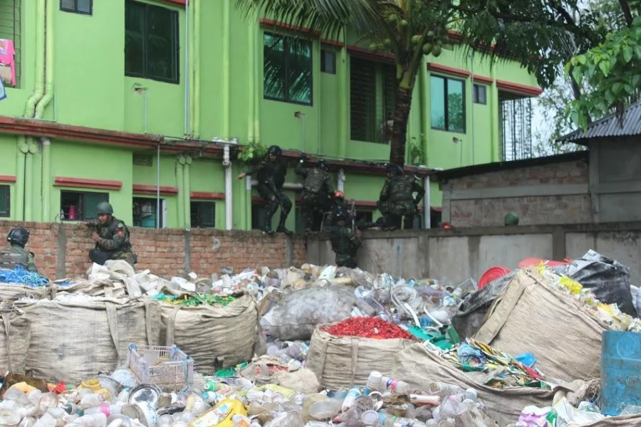 Para-commandos storm Atia Mahal in Shibbari, Sylhet on March 25, 2017 Courtesy