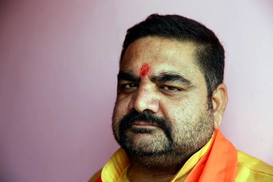 Pankaj Singh, senior leader of the Hindu Yuva Vahini vigilante group poses for a picture in the city of Unnao, India, April 5, 2017. Picture taken April 5, 2017. REUTERS/Cathal McNaughton    To Match Insight INDIA-POLITICS/RELIGION