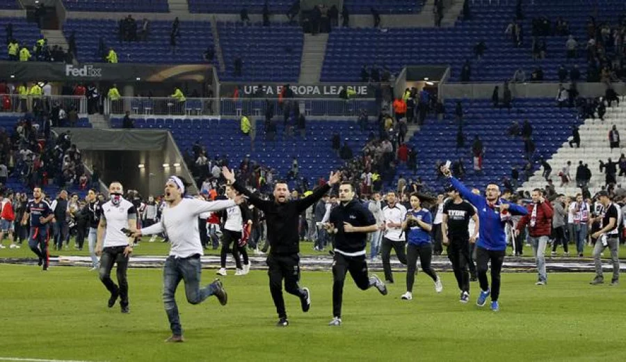 Football Soccer - Olympique Lyonnais v Besiktas - UEFA Europa League Quarter Final First Leg - Parc Olympique Lyonnais - 13/4/17 Fans invade the pitch Reuters / Emmanuel Foudrot Livepic