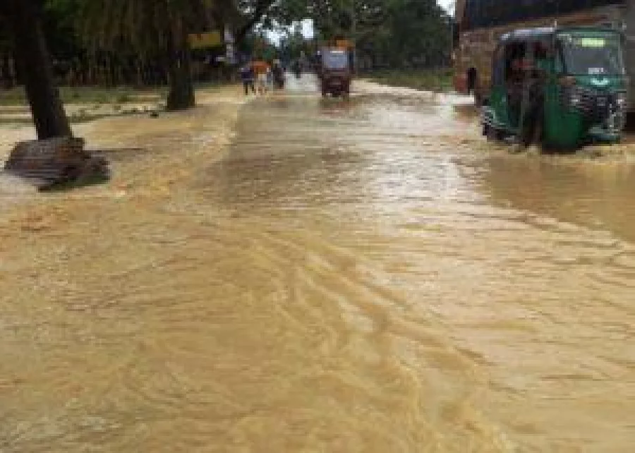 A road in Jhinaigati Upazila is submerged by flood water DHAKA TRIBUNE