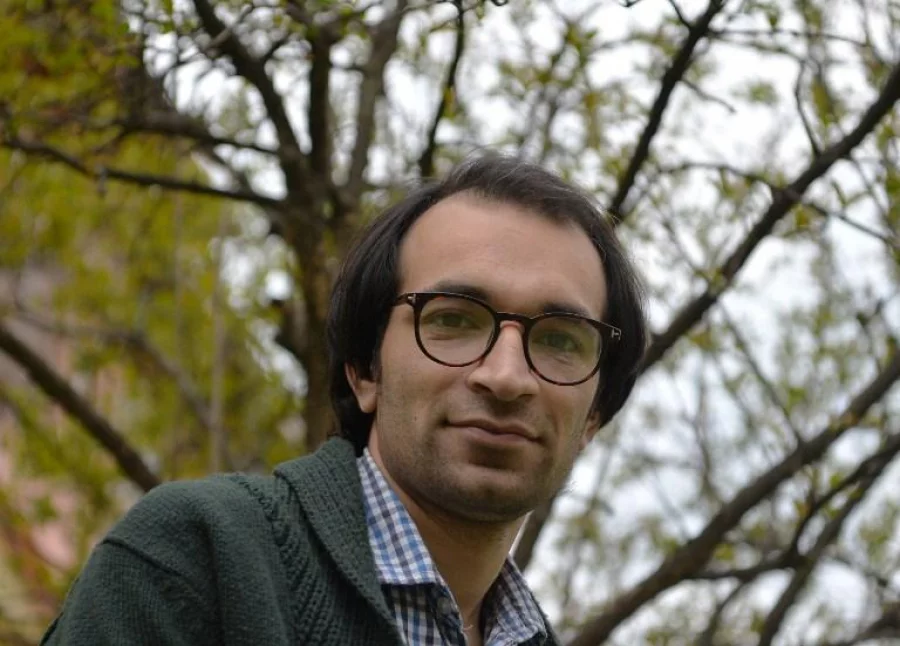 In this photograph taken on April 20, 2017, Kashmiri cartoonist Malik Sajad poses for a photograph at his home in Srinagar. Through sombre black and white drawings, graphic novelist Malik Sajad tells the brutal story of his native Kashmir in the 1990s, as an armed insurgency against Indian rule reached its bloody peak. Sajad's debut graphic novel "Munnu" is his account of growing up in the Kashmir Valley, one of the most spectacular but also most heavily militarised places on earth. / AFP PHOTO / TAUSEEF MUSTAFA / TO GO WITH 'India-Kashmir-unrest-literature', INTERVIEW BY Alexandre MARCHAND