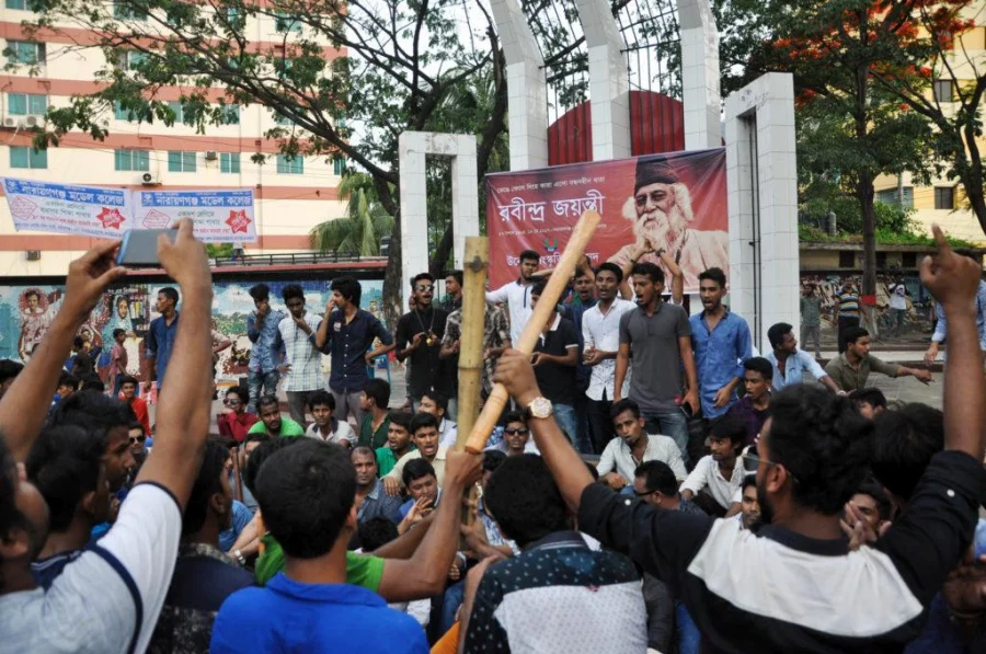 Chhatra League men in action at Narayanganj Shaheed Minar DHAKA TRIBUNE