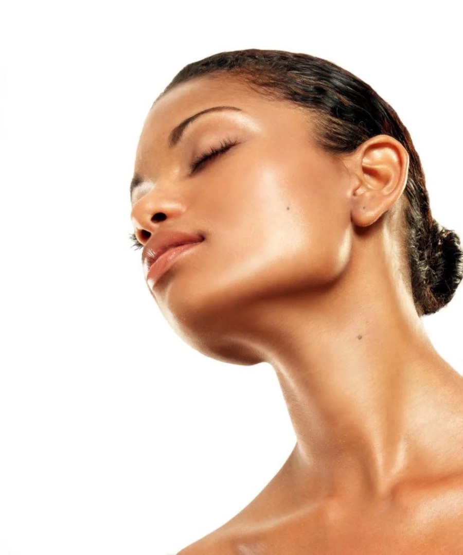 Beautiful young latin woman on white background. Closeup portrait of young beautiful woman after bath - spa