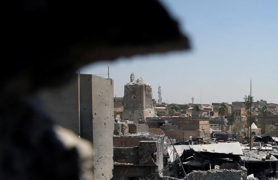 A destroyed al-Hadba minaret at Grand al-Nuri Mosque (L) is seen from an Iraqi held position at the Old City in Mosul, Iraq June 27, 2017 Photo: REUTERS