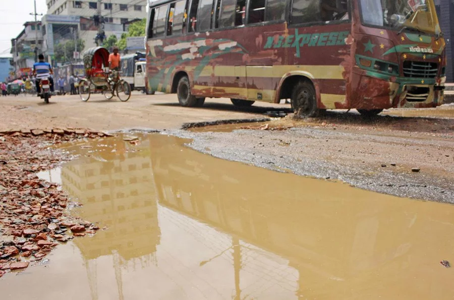 The roads are filled with puddles and potholes which is very risky, especially at night, as people often cannot see the damage Rabin Chowdhury/Dhaka Tribune