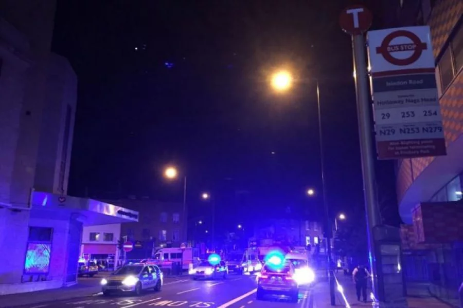Police are seen near Finsbury Park as British police say there are casualties after reports of vehicle colliding with pedestrians in North London, Britain June 19, 2017 REUTERS