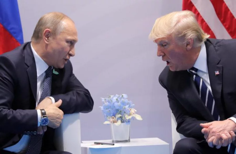 US President Donald Trump speaks with Russian President Vladimir Putin during their bilateral meeting at the G20 summit in Hamburg, Germany July 7, 2017 Reuters