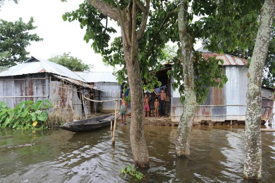 There is no way in, there is no way out, except for boats as floodwater pervades everywhere Dhaka Tribune