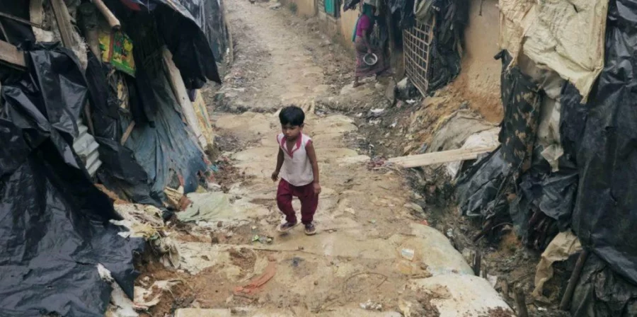 A lonely Rohingya child walks through the aisle of the Cox's Bazar's Kutupalong unregistered camp Shafiur Rahman