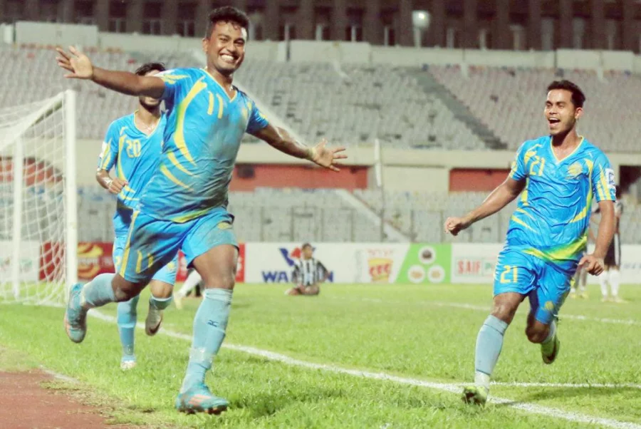 Dhaka Abahani's Rubel Miya celebrating the goal with his teammates.