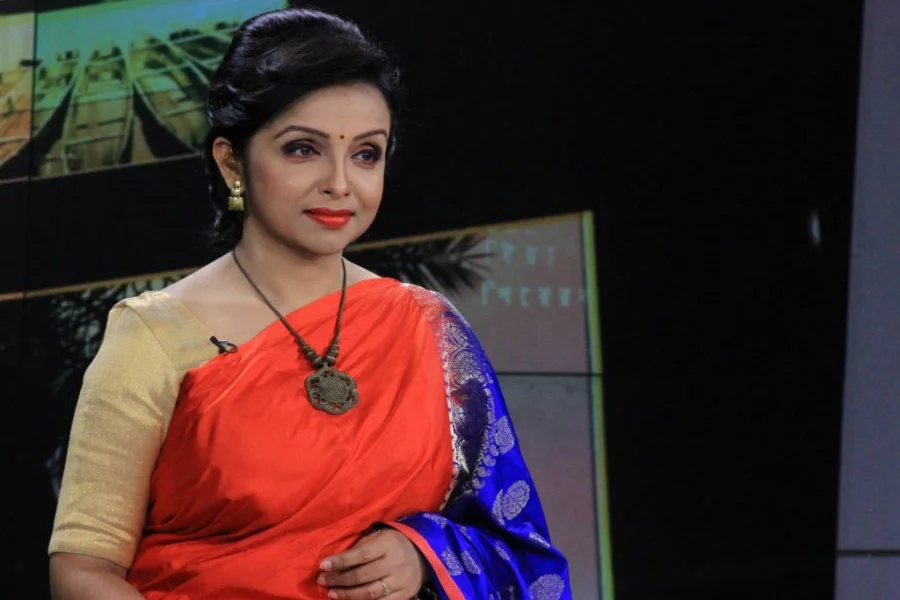 Jhumur Bari, a diplomatic reporter-cum-news anchor of Ekattor TV, remains dedicated to her job through the Eid festivities Collected