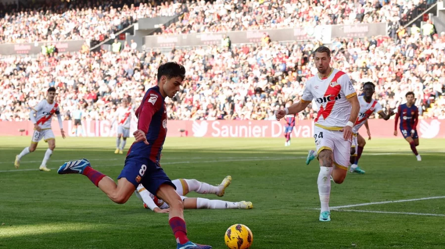 Barcelona's Pedri Gonzalez in action during Saturday's LaLiga match away to Rayo Vallecano Photo: AFP